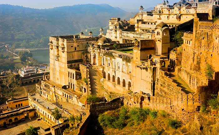 10 Hidden Gems in India Every Traveler Must Visit once Historic Bundi Palace in Rajasthan overlooking the town, showcasing intricate architecture and hilltop fort views